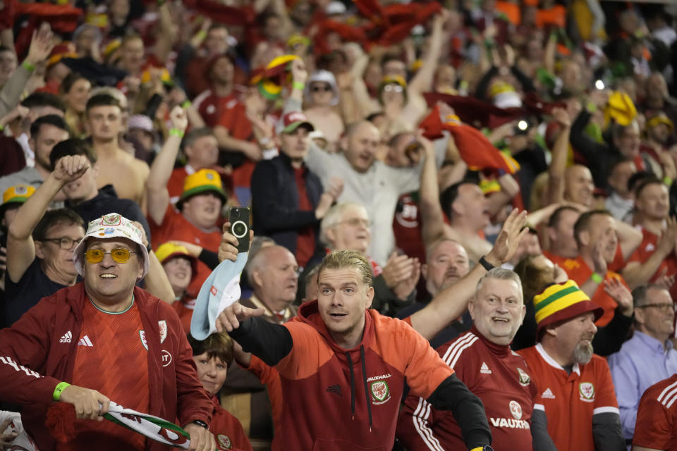 Wales' supporters cheer at the end of the Euro 2024 group D qualifying soccer match between Croatia and Wales at the Poljud stadium in Split, Croatia, Saturday, March 25, 2023. (AP Photo/Darko Bandic)