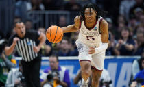 Gonzaga guard Hunter Sallis brings the ball up during the first half of the team's second-round college basketball game against TCU in the men's NCAA Tournament on Sunday, March 19, 2023, in Denver. (AP Photo/John Leyba)