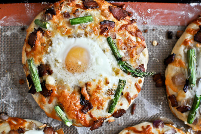 <strong>Get the <a href="http://www.howsweeteats.com/2012/05/bacon-egg-asparagus-personal-pizzas/">Bacon, Egg And Asparagus Personal Pizzas recipe</a> from How Sweet It Is</strong>