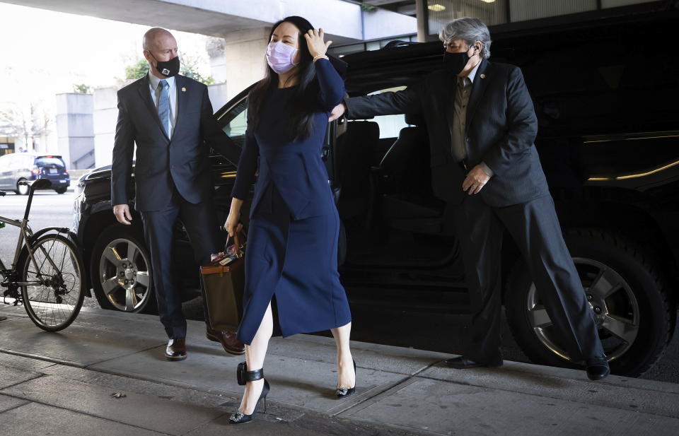 Meng Wanzhou, the chief financial officer of Huawei, arrives at British Columbia Supreme Court, in Vancouver, British Columbia, on Monday, March 15, 2021. (Darryl Dyck/The Canadian Press via AP)