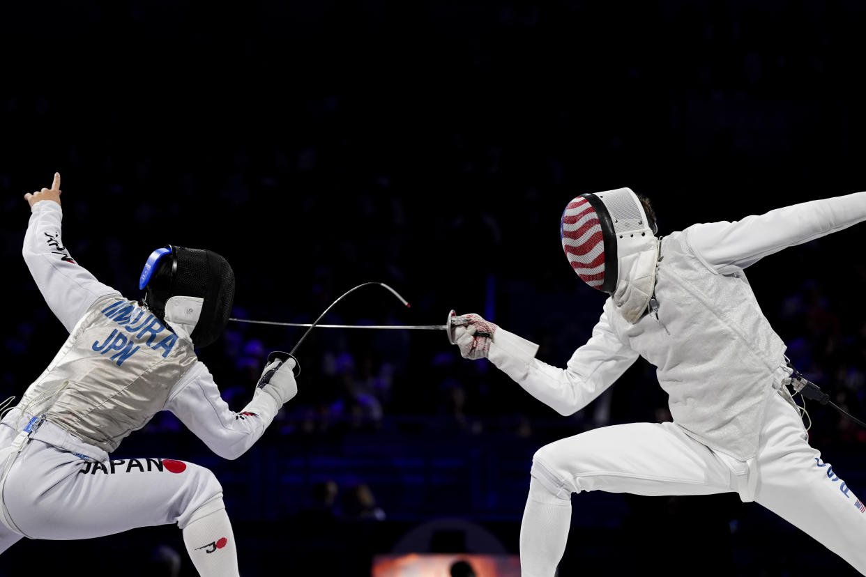 PARIS, FRANCE - JULY 29: US' Nick Itkin and Japan's Kazuki Iimura compete in the men's foil individual bronze medal bout during the Paris 2024 Olympic Games at the Grand Palais in Paris, France on July 29, 2024. Nick Itkin won the bronze medal. (Photo by Mustafa Ciftci/Anadolu via Getty Images)