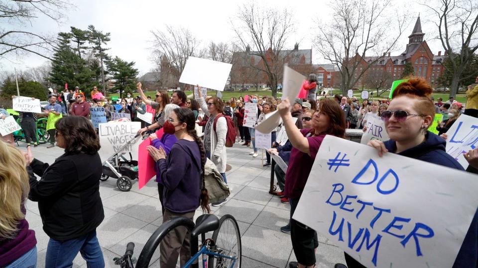 Over 150 University of Vermont staff, faculty, students, and supporters rally in support of UVM Staff United outside the Waterman Building on April 15, 2022.