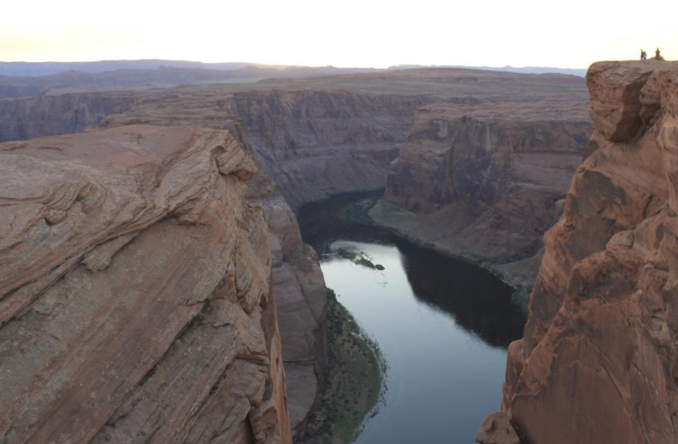 This Aug. 20, 2019 image shows the Colorado River flowing south of Page, Arizona. A plan by Utah could open the door to the state pursuing an expensive pipeline that critics say could further deplete Lake Powell, which is a key indicator of the Colorado River's health. (AP Photo/Susan Montoya Bryan)