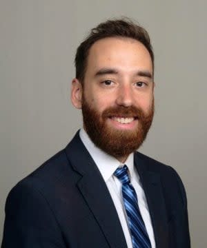 A portrait of Cody Lachner, certified financial planner and director of financial planning at BBK Wealth Management.