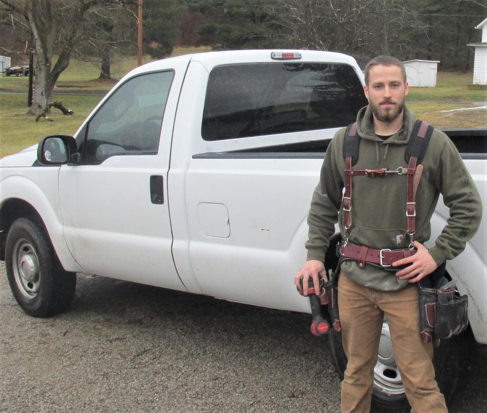 Armed with his tool belt and his pickup, Brandon Zemrock is ready to put his carpentry skills to work.