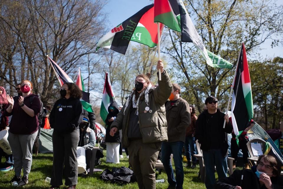 Michigan State University students and others demonstrate Thursday, April 25, 2024, joining students on college campuses across the U.S. calling for their schools to divest from Israel amid the ongoing war in Gaza.