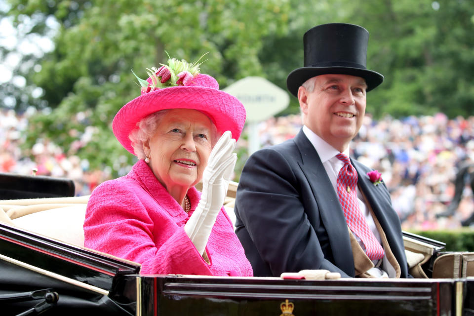 The Queen sits beside her son, Prince Andrew, in a royal carriage