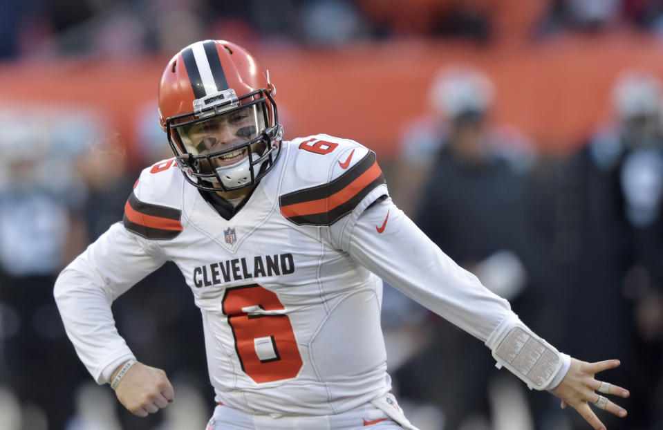 Cleveland Browns quarterback Baker Mayfield celebrates after running back Nick Chubb rushed for a 4-yard touchdown during the second half of an NFL football game against the Carolina Panthers, Sunday, Dec. 9, 2018, in Cleveland. (AP Photo/David Richard)