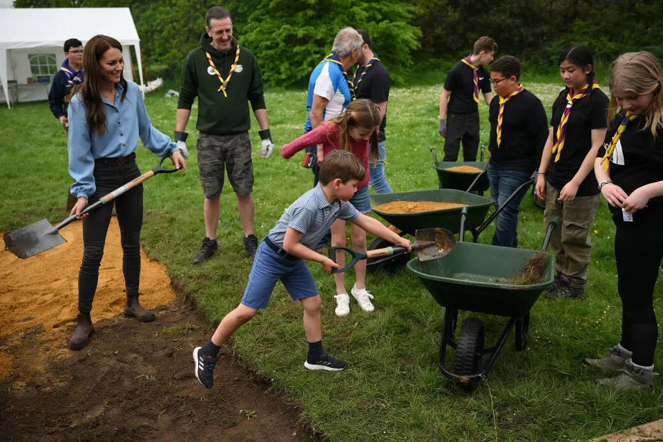 LONDON, ENGLAND - MAY 08: Prince Louis of Wales helps his mother, Catherine, Princess of Wales, take part in the Big Help Out, during a visit to the 3rd Upton Scouts Hut in Slough on May 8, 2023 in London, England. The Big Help Out is a day when people are encouraged to volunteer in their communities. It is part of the celebrations of the Coronation of Charles III and his wife, Camilla, as King and Queen of the United Kingdom of Great Britain and Northern Ireland, and the other Commonwealth realms that took place at Westminster Abbey on Saturday, May 6, 2023. (Photo by Daniel Leal - WPA Pool/Getty Images), Prince Louis had an action-packed day with the Scouts on Monday (Getty)., The Coronation Of Their Majesties King Charles III And Queen Camilla - The Big Help Out