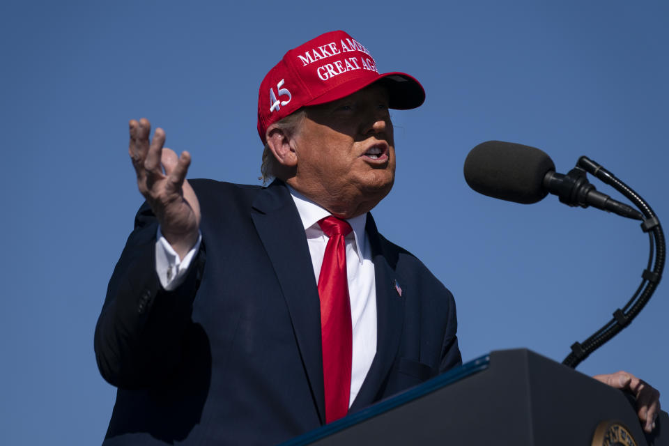 President Donald Trump speaks during a campaign rally at Laughlin/Bullhead International Airport, Wednesday, Oct. 28, 2020, in Bullhead City, Ariz. Trump is painting an apocalyptic portrait of American life if Democrat Joe Biden gets elected. The president claims that if the Democrat takes over, the suburbs wouldn’t be the suburbs anymore, the economy would slump into its worst depression ever and police departments would cease to exist. (AP Photo/Evan Vucci)