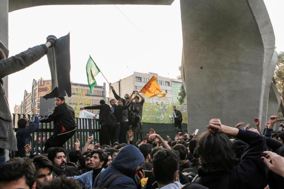 <p>People gather to protest over high cost of living in Tehran, Iran on Dec. 30, 2017. (Photo: Stringer/Anadolu Agency/Getty Images) </p>