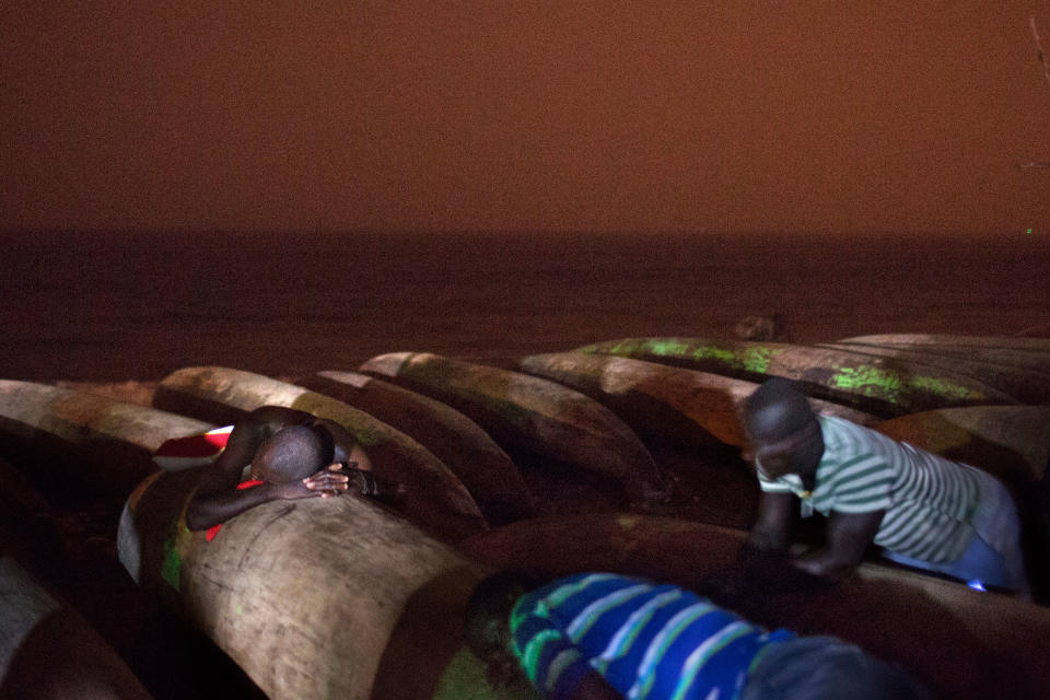 Canoes line the beach in West Point. | Kathleen Flynn, special to ProPublica