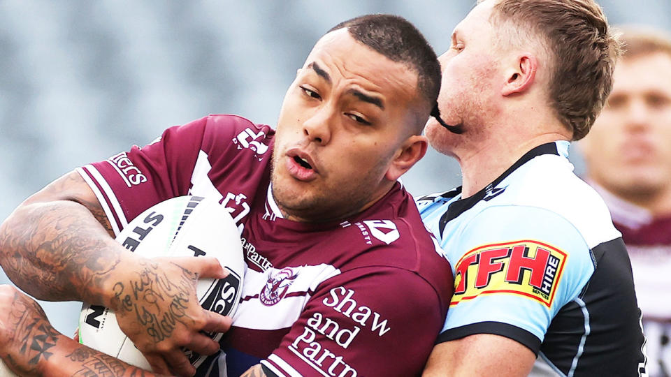 Addin Fonua-Blake getting tackled after a hit-up.