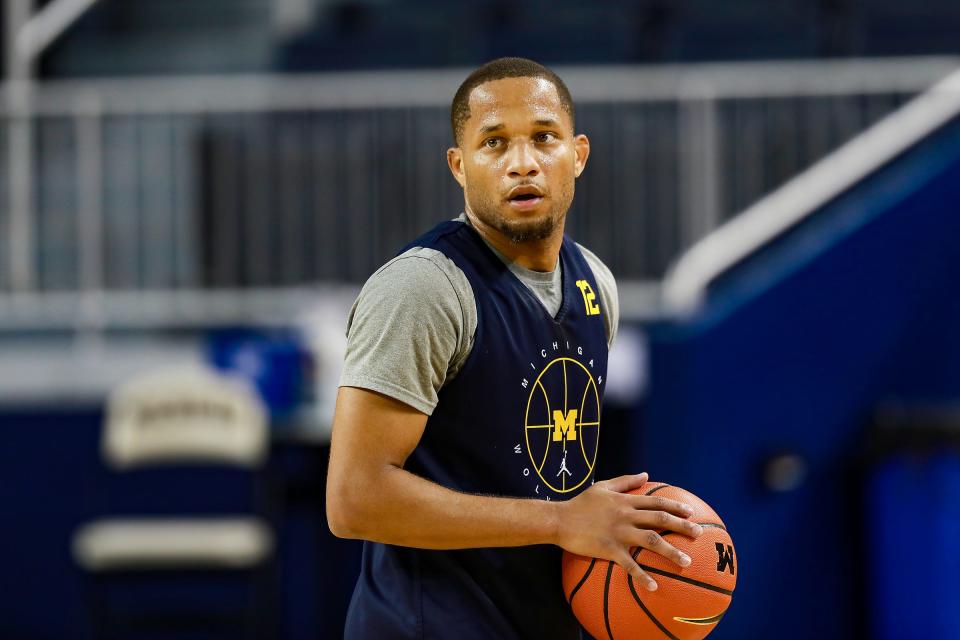 Michigan basketball guard DeVante' Jones practices with his team during media day Oct. 15. 2021 at Crisler Center.