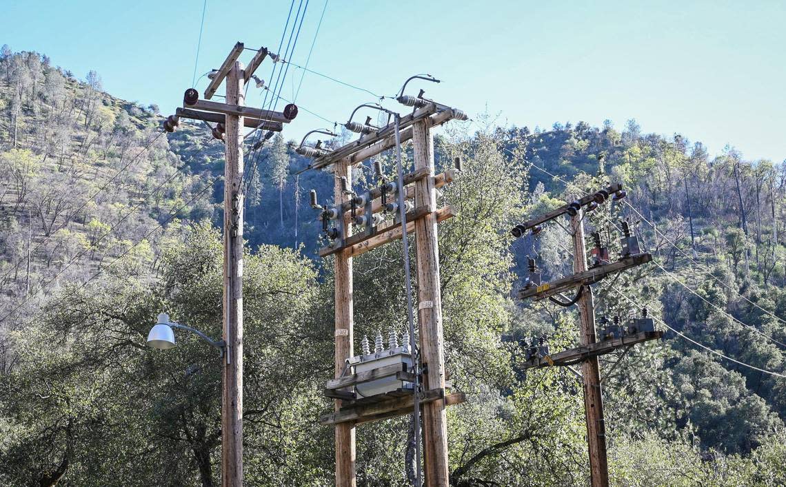 Power lines converge among a grouping of poles in the El Portal Trailer Park near Yosemite National Park on Sunday, March 13, 2022.