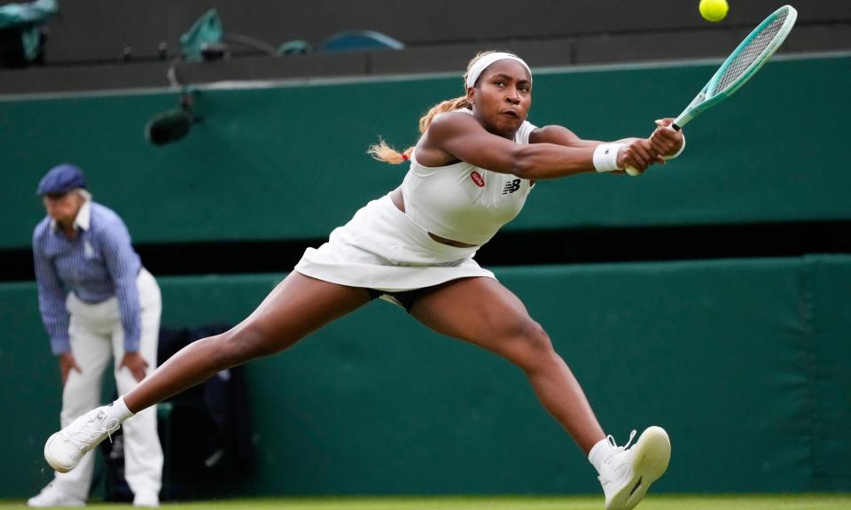<span>Coco Gauff is at full stretch to make a backhand return.</span><span>Photograph: Kirsty Wigglesworth/AP</span>
