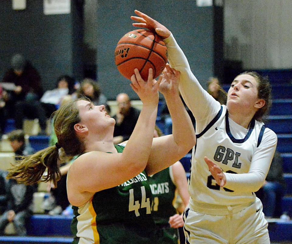 Great Plains Lutheran's Esta Cameron (right) defends against Northwestern's Adriana Ratigan during a high school basketball doubleheader on Thursday, Feb. 9, 2023 in Watertown.