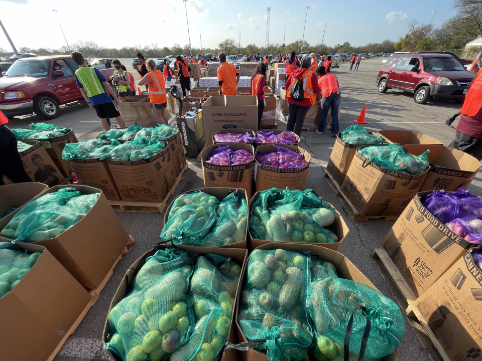 Food is seen in large bins before being distributed to the community.  / Credit: Spectra/Fair Park First