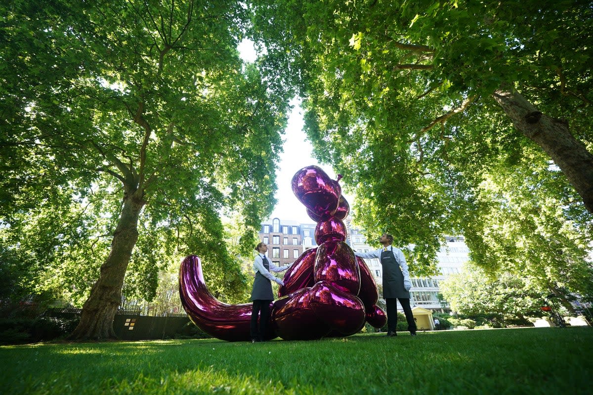 Balloon Monkey (Magenta) on display in St James’s Square, London (Yui Mok/PA) (PA Wire)