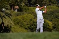 Feb 16, 2018; Pacific Palisades, CA, USA; Tiger Woods plays his second shot on the fifth hole during the second round of the Genesis Open golf tournament at Riviera Country Club. Mandatory Credit: Orlando Ramirez-USA TODAY Sports