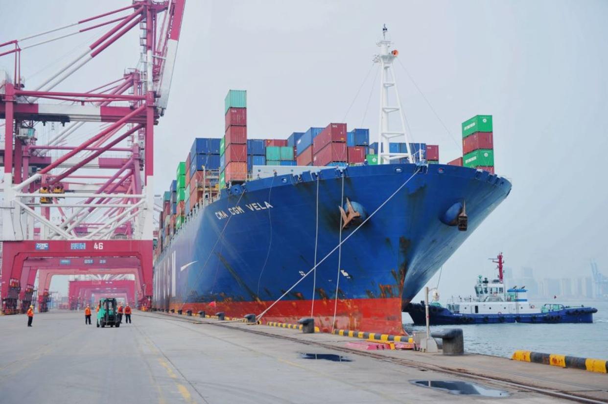 <span class="caption">A moored container ship in Qingdao, China.</span> <span class="attribution"><a class="link " href="https://www.gettyimages.com/detail/news-photo/longshoremen-rope-a-recently-moored-freighter-in-qingdao-news-photo/1217233473?adppopup=true" rel="nofollow noopener" target="_blank" data-ylk="slk:Getty Images;elm:context_link;itc:0;sec:content-canvas">Getty Images</a></span>