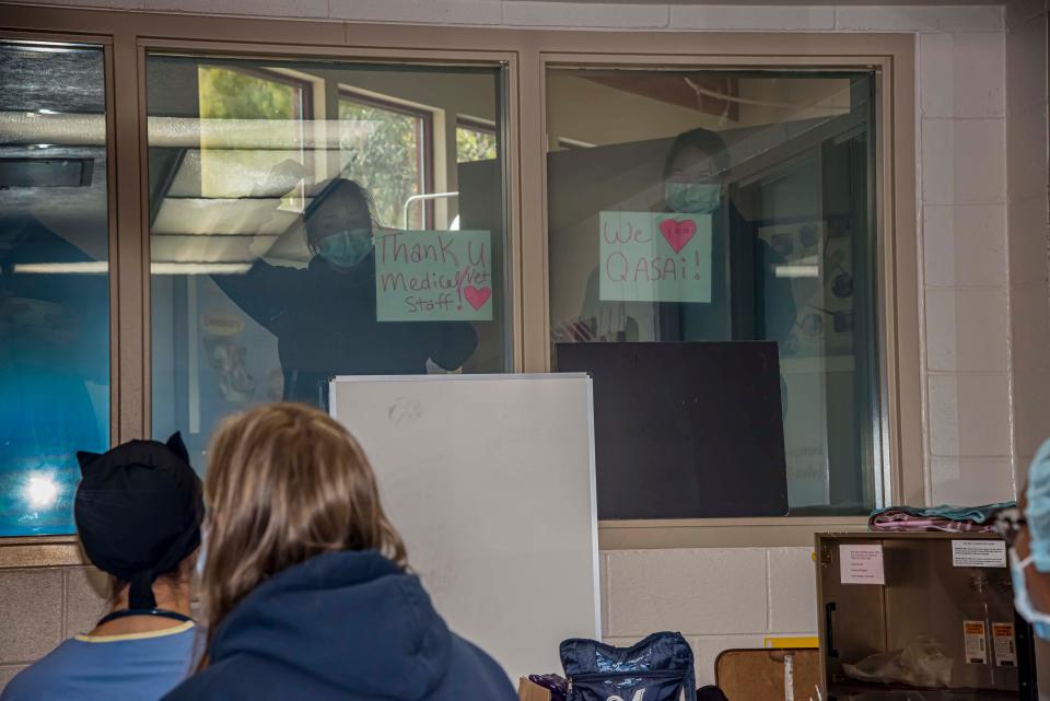 Milwaukee County Zoo staff watch and await the outcome of Qasai's surgery.