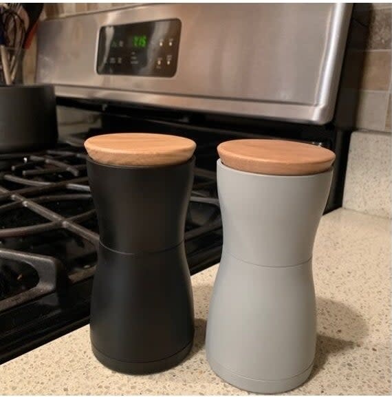 Reviewer's photo of salt and pepper shakers on kitchen counter.