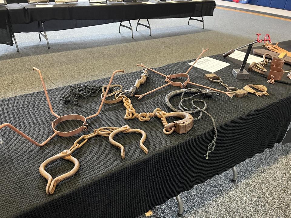 A wood-handled whip, leg shackles for both children and adults, neck restraints and other items used to abuse and control slaves were on display Saturday at Daytona Beach's Midtown Cultural and Educational Center as part of the annual Juneteenth festival.