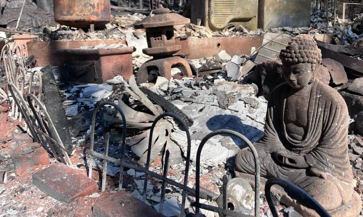 <span>The remnants of Kristy and Michael Daneau’s home in Cohasset, California. They previously lost their home in the 2018 Camp fire.</span><span>Photograph: Kristy and Michael Daneau/The Guardian</span>