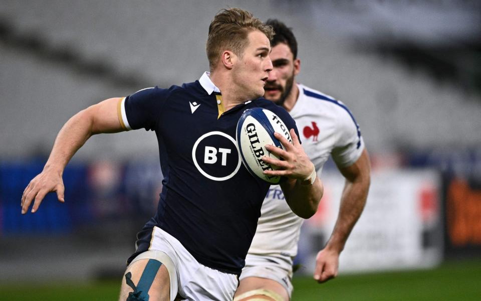 Scotland's wing Duhan van der Merwe runs with the ball during the Six Nations rugby union tournament match between France and Scotland on March 26 2021, at the Stade de France in Saint-Denis, outside Paris - ANNE-CHRISTINE POUJOULAT/AFP via Getty Images