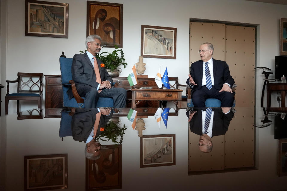 Cyprus' foreign minister Ioannis Kasoulides, right, and his Indian counterpart Subrahmanyam Jaishankar meet at the foreign house in capital Nicosia, Cyprus, Thursday, Dec. 29, 2022. Jaishankar is in Cyprus for a two-day official visit. (AP Photo/Petros Karadjias)