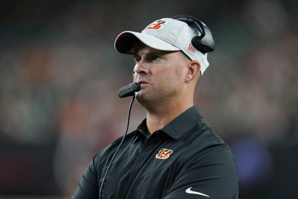 Cincinnati Bengals head coach Zac Taylor watches from the sideline as his team plays against the Arizona Cardinals during the second half of an NFL football preseason game in Cincinnati, Friday, Aug. 12, 2022. (AP Photo/Michael Conroy)