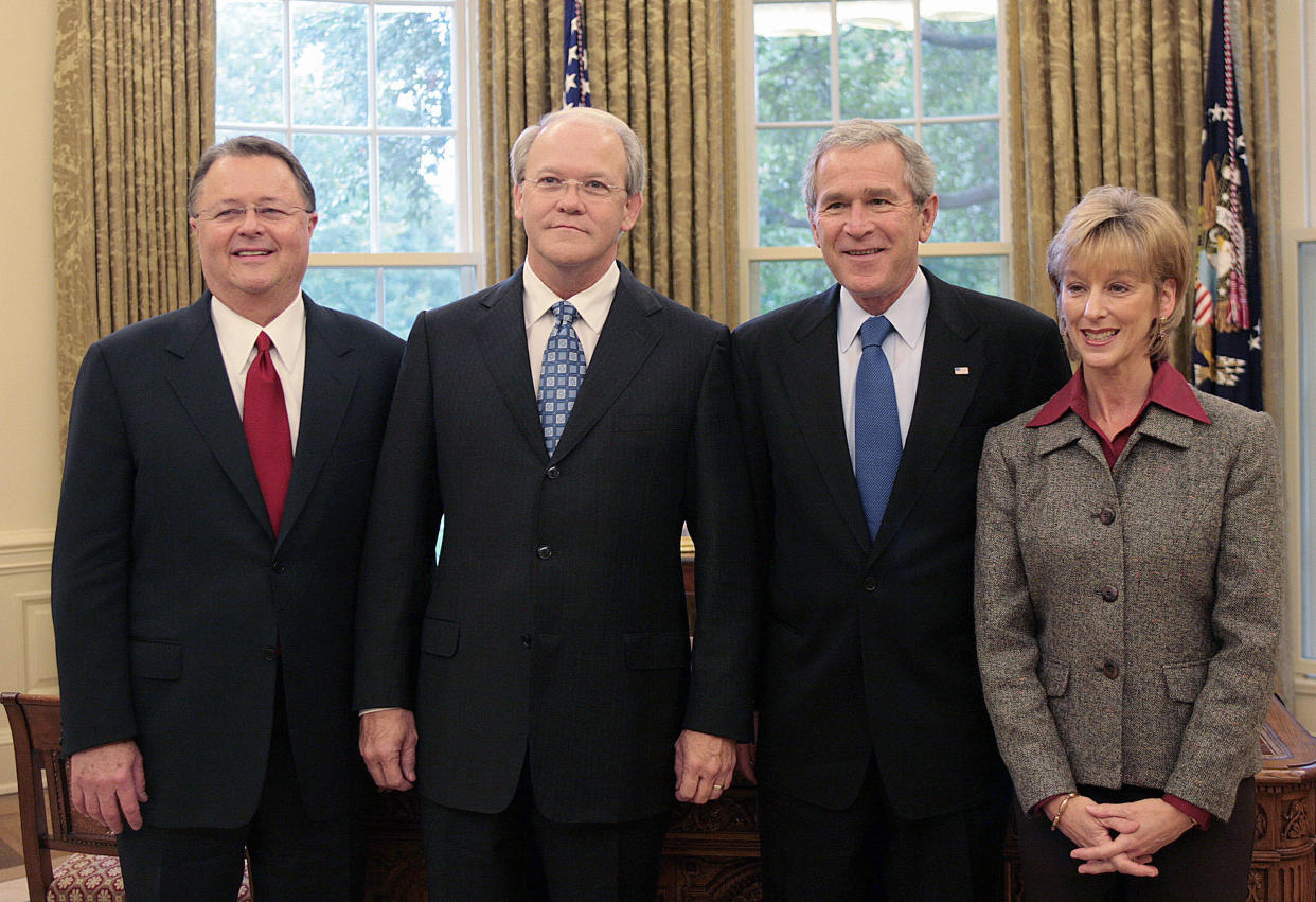 President George W. Bush poses with&nbsp;Dr. Frank Page (second from left) and his wife Dayle, and another Southern Baptist leader, in 2006. At the time, Page was the president of the Southern Baptist Convention. (Photo: JIM WATSON via Getty Images)