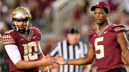 Jameis Winston congratulates QB Sean McGuire during Florida State's win over Clemson. (CampusInsider)