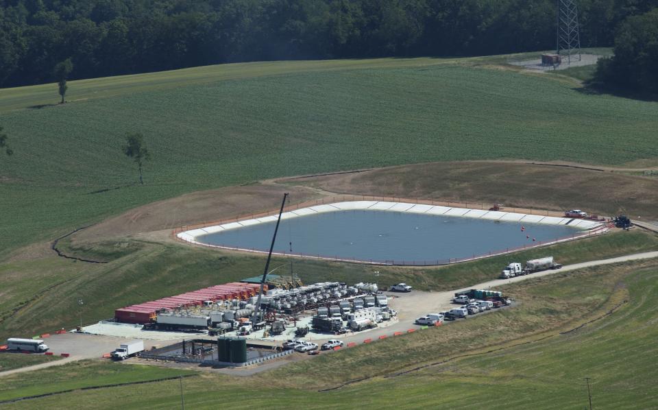 A pit containing fresh water or fresh water with chemicals sits next to a drill site in Butler County, Penn.&nbsp; (Photo: MCT via Getty Images)