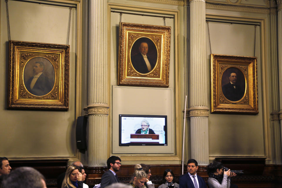 In this July 10, 2018 photo, Dr. Martha Rosenberg, a pioneer for the decriminalization of abortion, testifies before a Senate commission, in Buenos Aires, Argentina. The lower house recently approved a bill that would legalize elective abortion in the first 14 weeks of pregnancy. The measure is to be voted on by the Senate on Aug. 8. (AP Photo/Jorge Saenz)