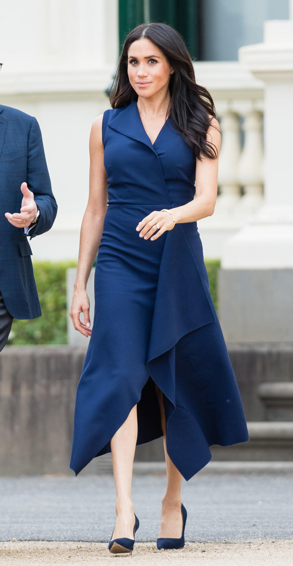 The duchess wears a <a href="https://global.dionlee.com/shop/dion-lee/new-/folded-sail-dress-a9564-p19/281031" target="_blank" rel="noopener noreferrer">Dion Lee dress</a> on Oct. 18, day three of the royal tour. The dress, which costs $990, is currently available for preorder.
