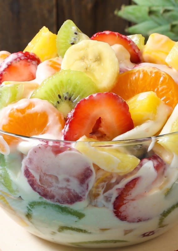 Chad A Elick<p>Hawaiian Cheesecake Salad comes together so simply with fresh tropical fruit and a rich and creamy cheesecake filling to create the most glorious fruit salad ever! Every bite is absolutely bursting with island flavor and you are going to go nuts over this recipe!</p><p><strong>Get the recipe: </strong><a href="https://www.theslowroasteditalian.com/2017/04/hawaiian-cheesecake-salad.html" rel="sponsored" target="_blank" data-ylk="slk:Hawaiian Cheesecake Salad;elm:context_link;itc:0;sec:content-canvas" class="link "><strong>Hawaiian Cheesecake Salad</strong></a></p>