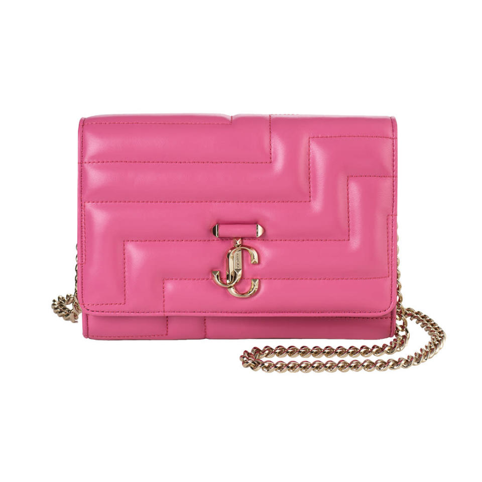 Jimmy Choo Fall’s hot-pink Barbiecore trend is seen in the Varenne Avenue clutch in Candy Pink Avenue napa leather with gold “JC” emblem; 1,350, at Jimmy Choo, Beverly Hills