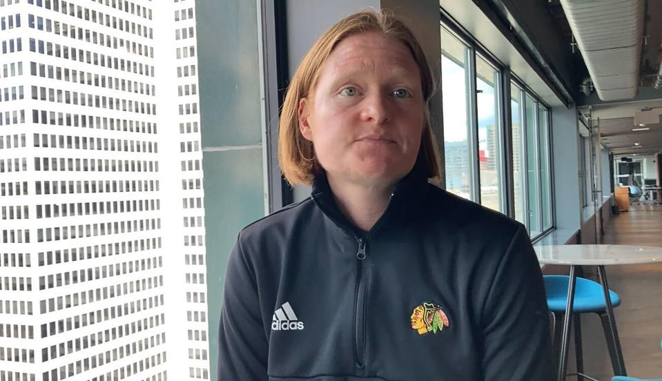 Chicago Blackhawks hockey team assistant general manager Meghan Hunter speaks during an interview ahead of the NHL draft in Montreal, Wednesday, July 6, 2022. Hunter is one of five women currently serving as assistant GMs in the NHL. (AP Photo/Stephen Whyno)