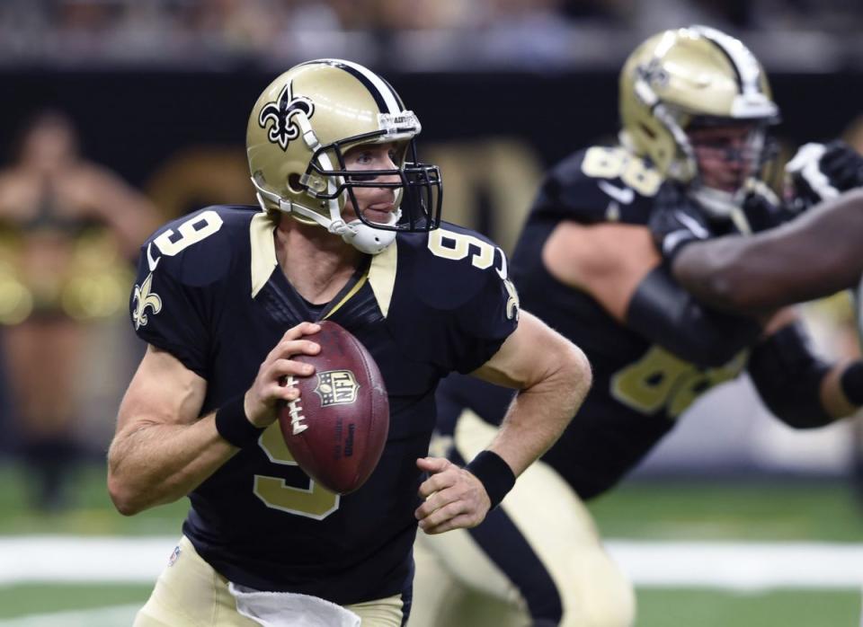 New Orleans Saints quarterback Drew Brees (9) scrambles in the first half of an NFL football game against the Baltimore Ravens in New Orleans, Thursday, Sept. 1, 2016. (AP Photo/Bill Feig)