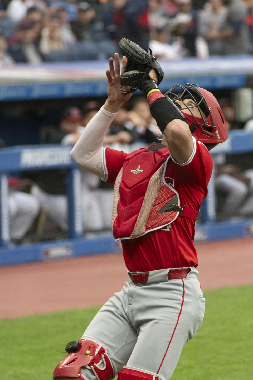 Los Angeles Angels' Logan O'Hoppe waits to catch a pop foul by Cleveland Guardians' Jose Ramirez during the first inning of a baseball game in Cleveland Saturday, May 4, 2024. (AP Photo/Phil Long)