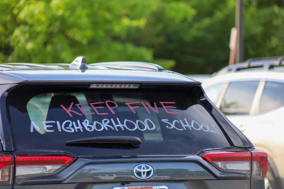 Some Hyde Elementary School supporters decorated the rear of their cars with messages supporting their school Monday.