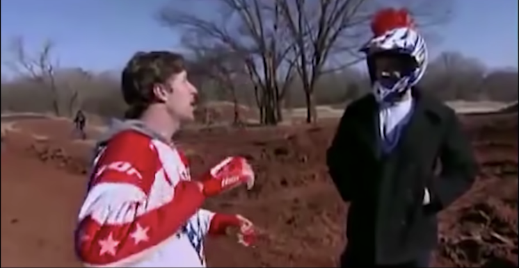 A stuntman tries to explain to Johnny Knoxville how not to die while backflipping a motorcycle