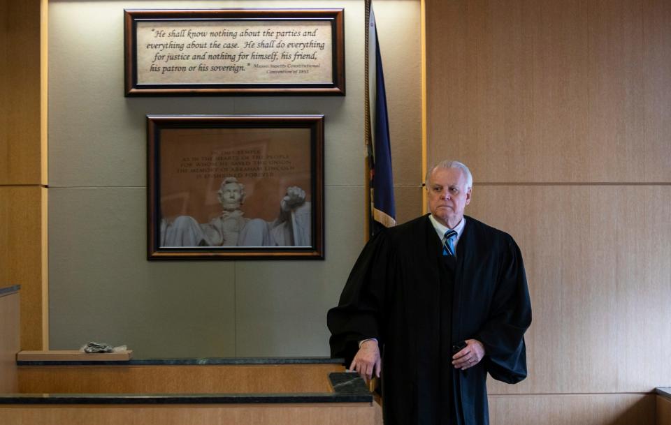 Wayne County Circuit Court Chief Judge Timothy Kenny stands inside his courtroom at the Coleman A. Young Municipal Center in Detroit on Thursday, Dec. 8, 2022. Judge Kenny retired last year.