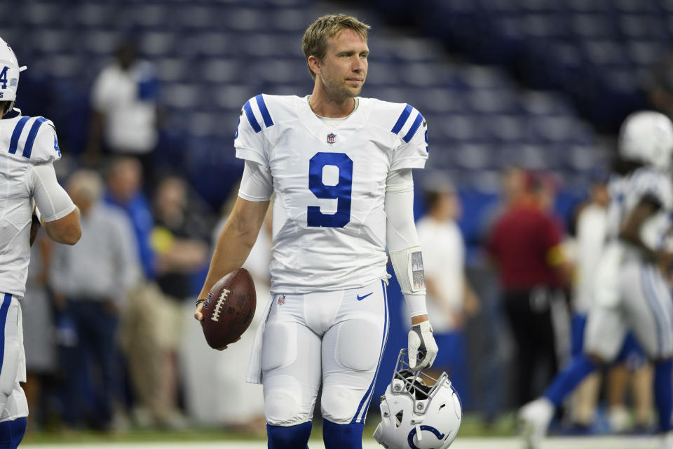 FILE - Indianapolis Colts quarterback Nick Foles (9) walks on the field before an NFL preseason football game against the Detroit Lions on Aug. 20, 2022, in Indianapolis. The Colts released Foles on Friday, May 5, 2023, saving about $2 million in salary cap space while creating room for the 12 rookies it added last week in the draft (AP Photo/Zach Bolinger, File)