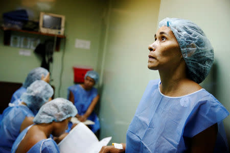 Women wait for sterilization surgery a hospital in Caracas, Venezuela July 27, 2016. REUTERS/Carlos Garcia Rawlins