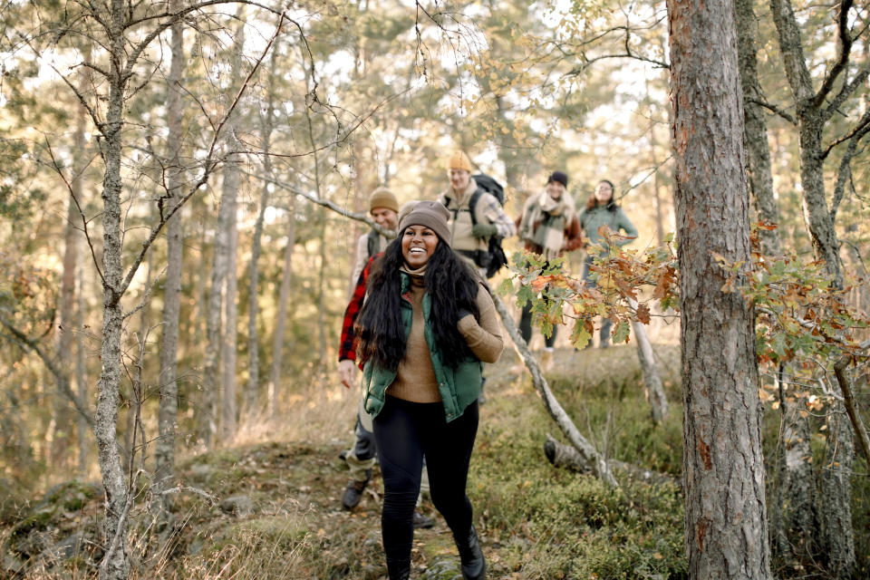 Group backpacking in the woods