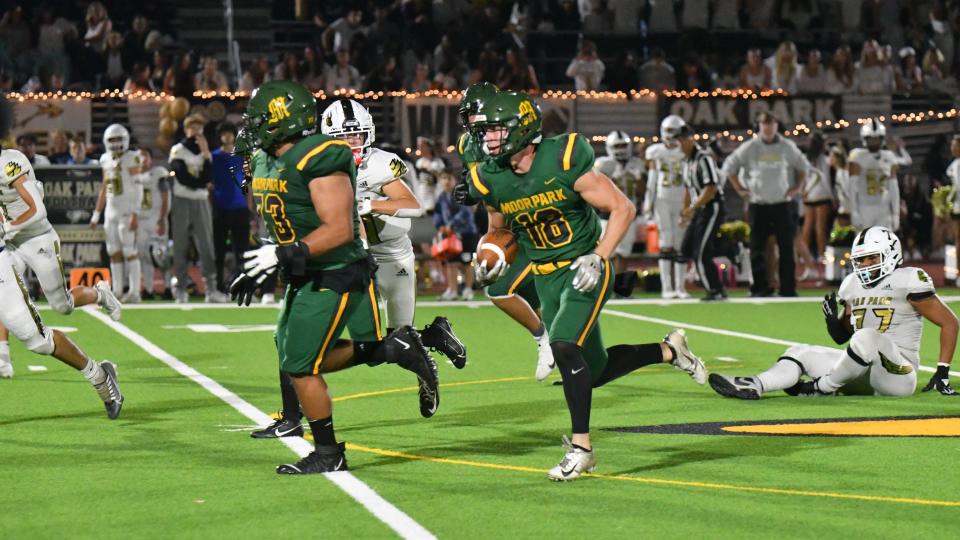 Moorpark's Cooper Cronquist finds room to run against Oak Park during the teams' Canyon League game on Sept. 22.