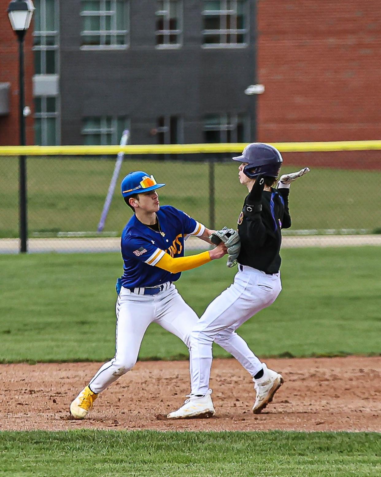 Adrian Gonzalez (1) puts the tag on Andrew Richardson (8) in the 2nd inning. The Northern Lebanon Vikings played host to the Lancaster Catholic Crusaders in a LL League Section 4 Baseball game on Friday April 5, 2024. The Vikings defeated the Crusaders 10-3.